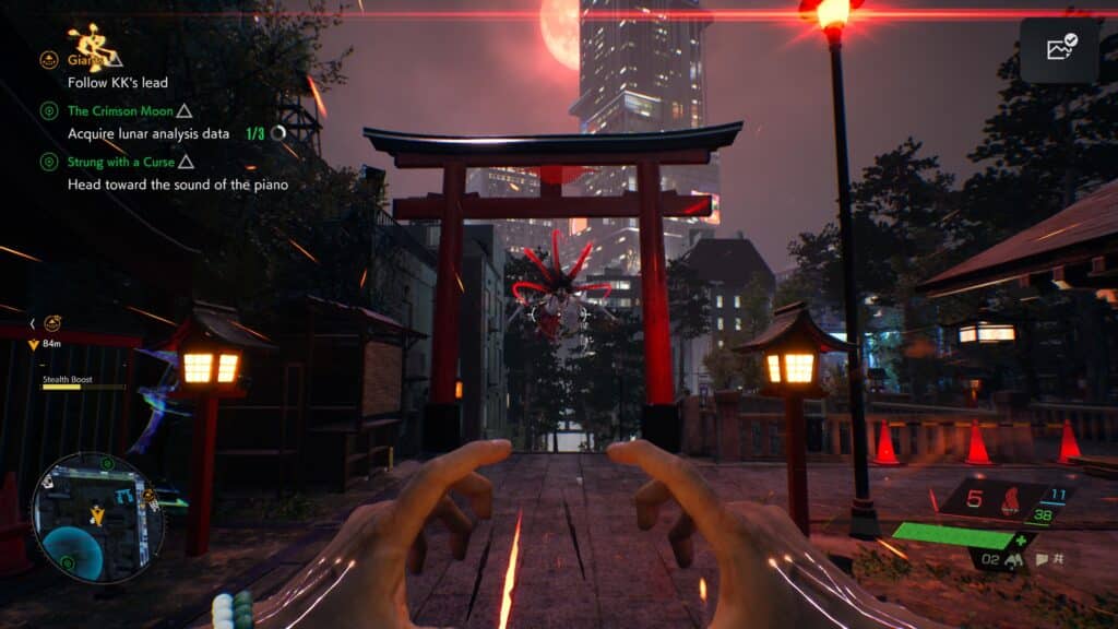 Fighting an enemy at a Torii gate in Ghostwire Tokyo